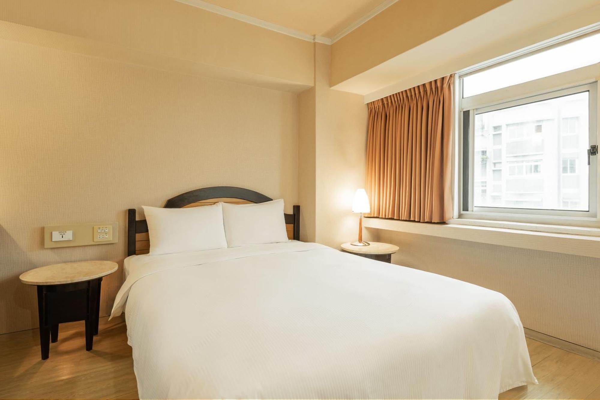Kindness Hotel Weiwuying Каосюн Стая снимка