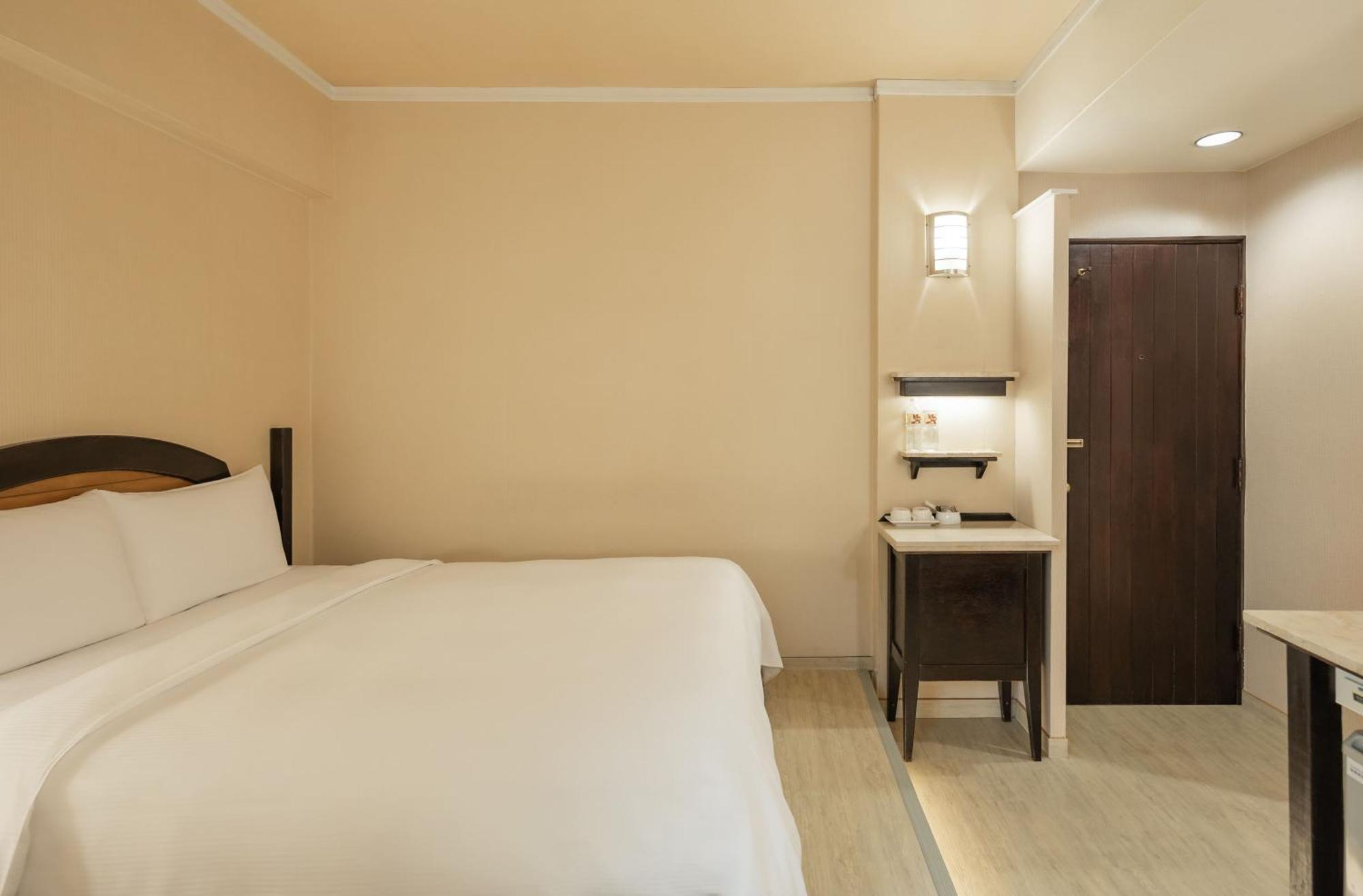 Kindness Hotel Weiwuying Каосюн Стая снимка