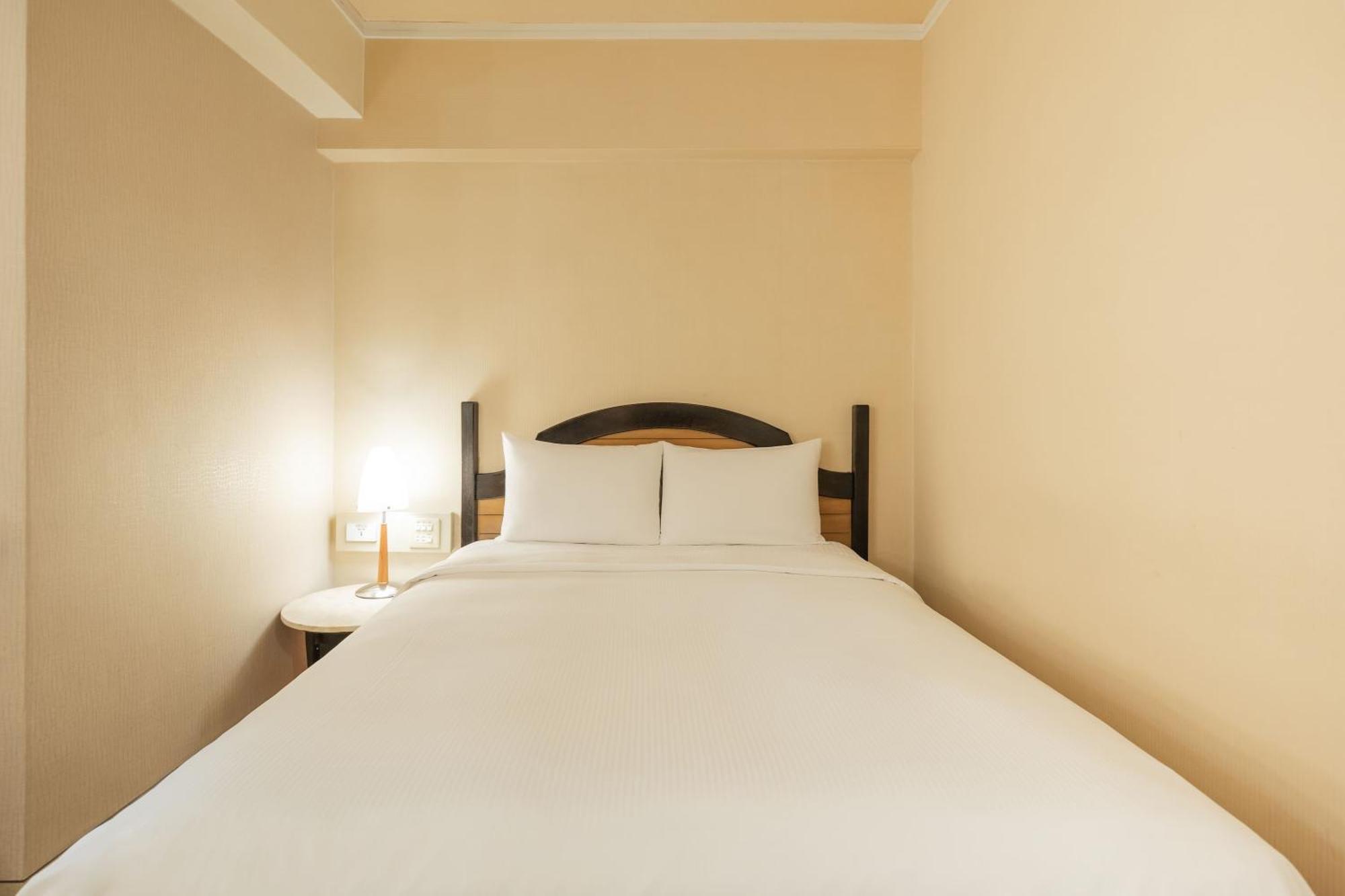 Kindness Hotel Weiwuying Каосюн Стая снимка